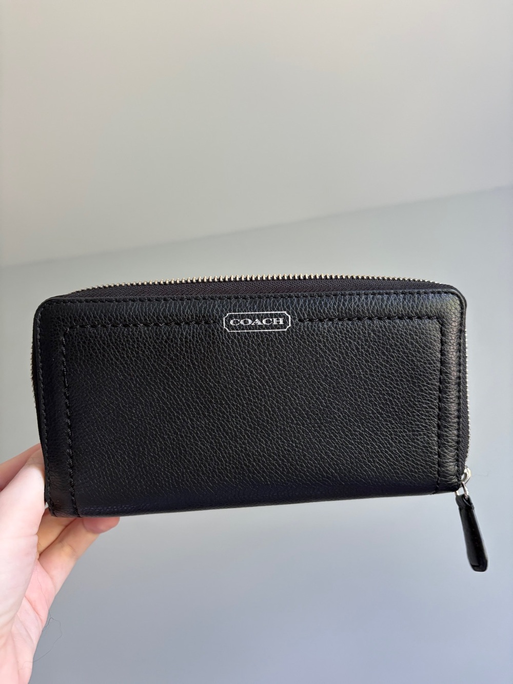 Black leather Coach zip wallet